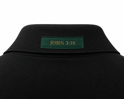 The Verse Polo™ in Graphite — back collar detail showing the Ordinary green verse patch, John 3:16