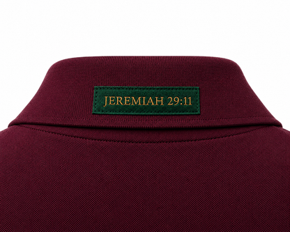 The Verse Polo™ in Burgundy — back collar detail showing the Ordinary green verse patch, Jeremiah 29:11
