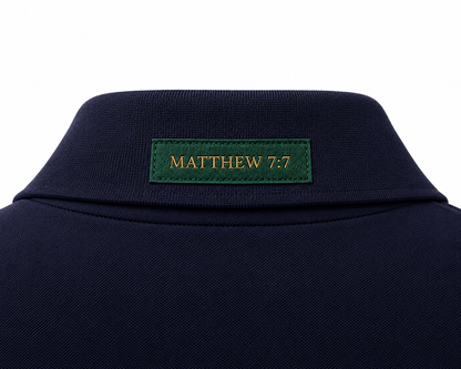 The Verse Polo™ in Navy — back collar detail showing the Ordinary green verse patch, Matthew 7:7